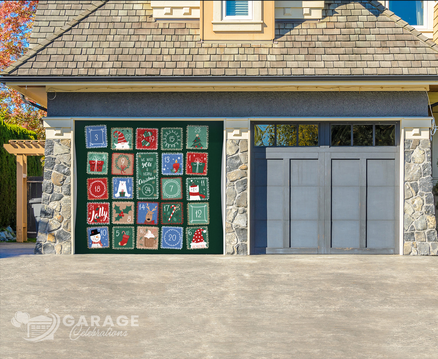 Garage door cover with decorative Christmas-themed advent calendar quilt design on a stone house.