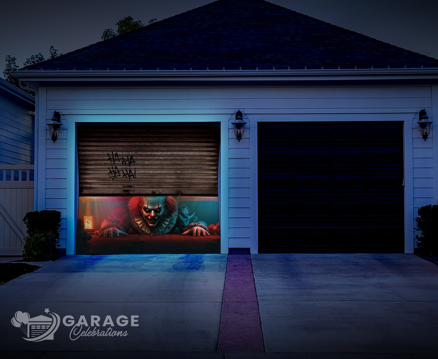 Garage door with a colorful design of a clown and text, illuminated by blue lights at night.