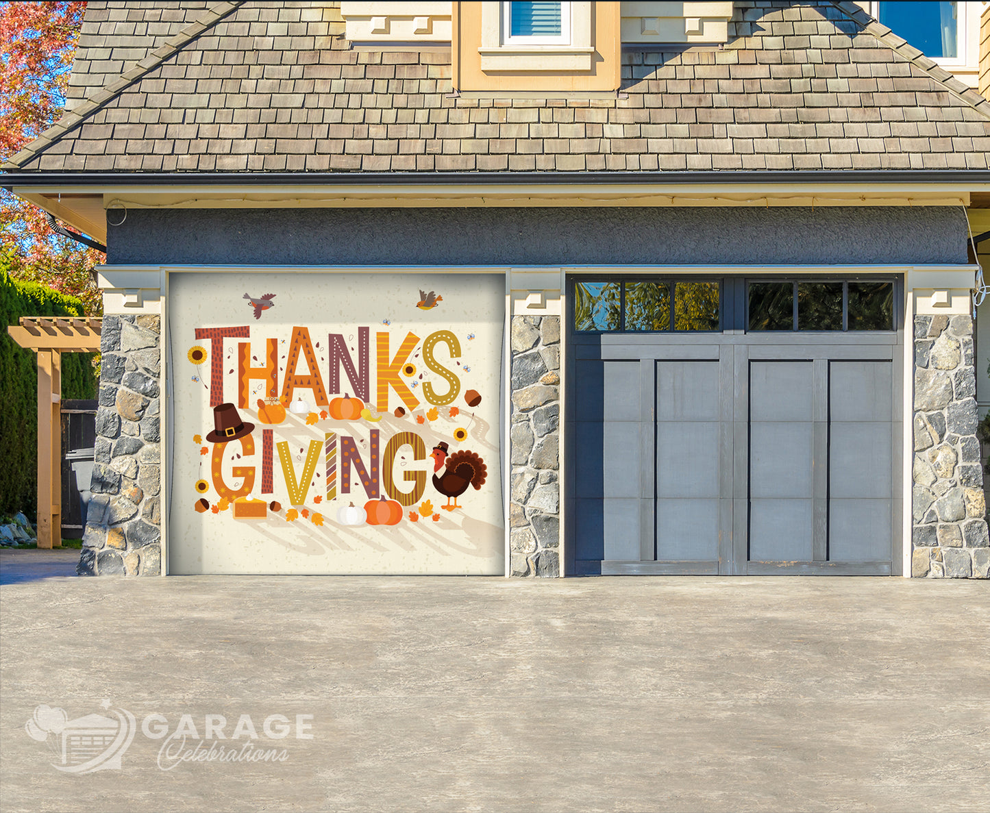 Garage door with Thanksgiving-themed design in front of a house