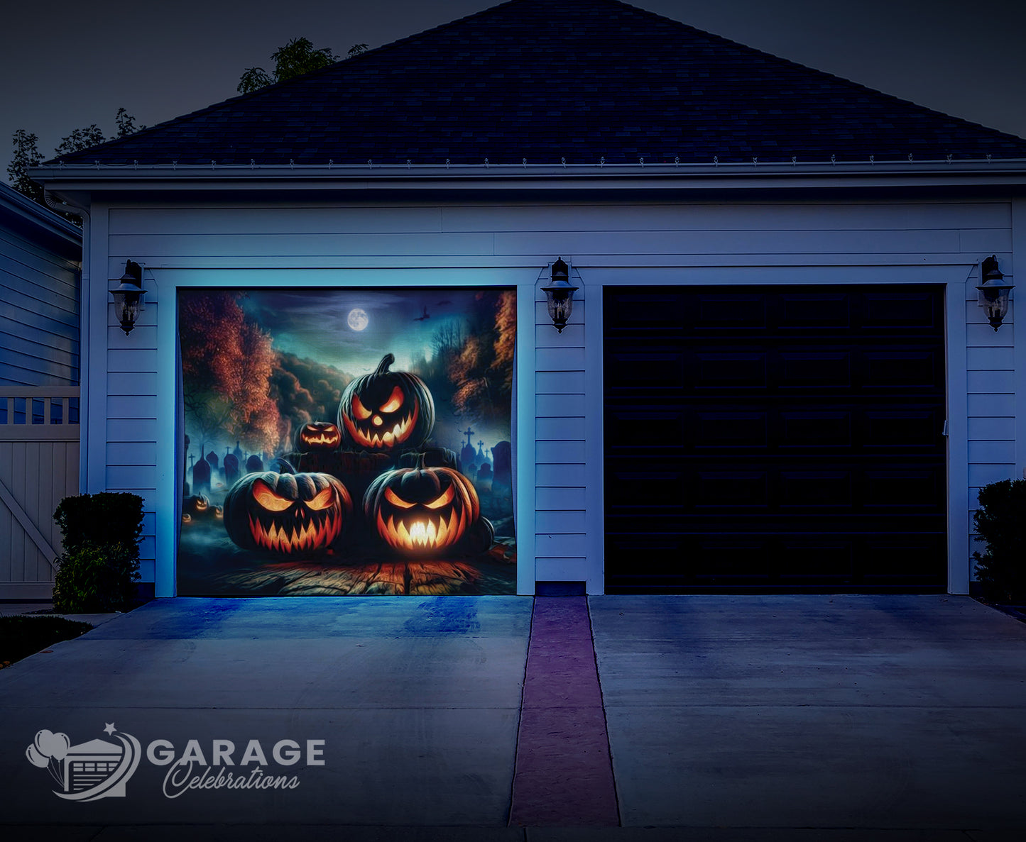 Garage door with Halloween-themed decoration featuring jack-o'-lanterns and a full moon.