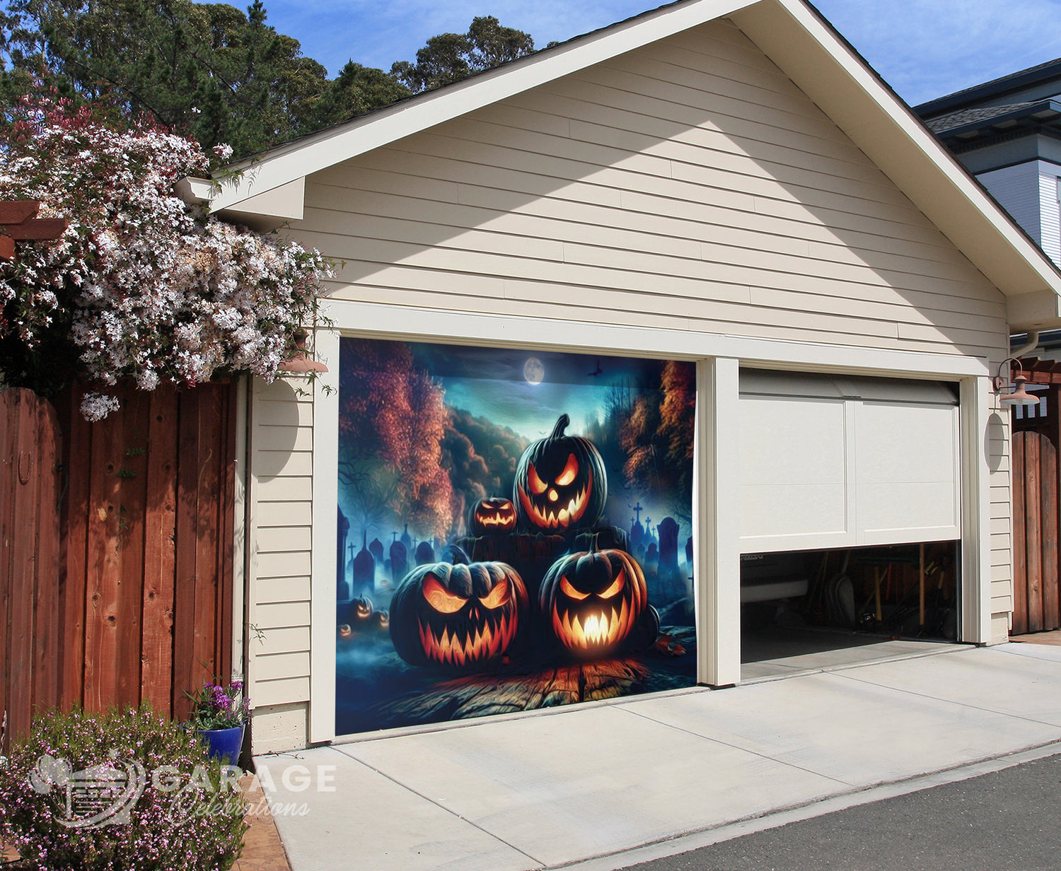 Garage door with Halloween-themed design featuring jack-o'-lanterns and a moonlit sky.