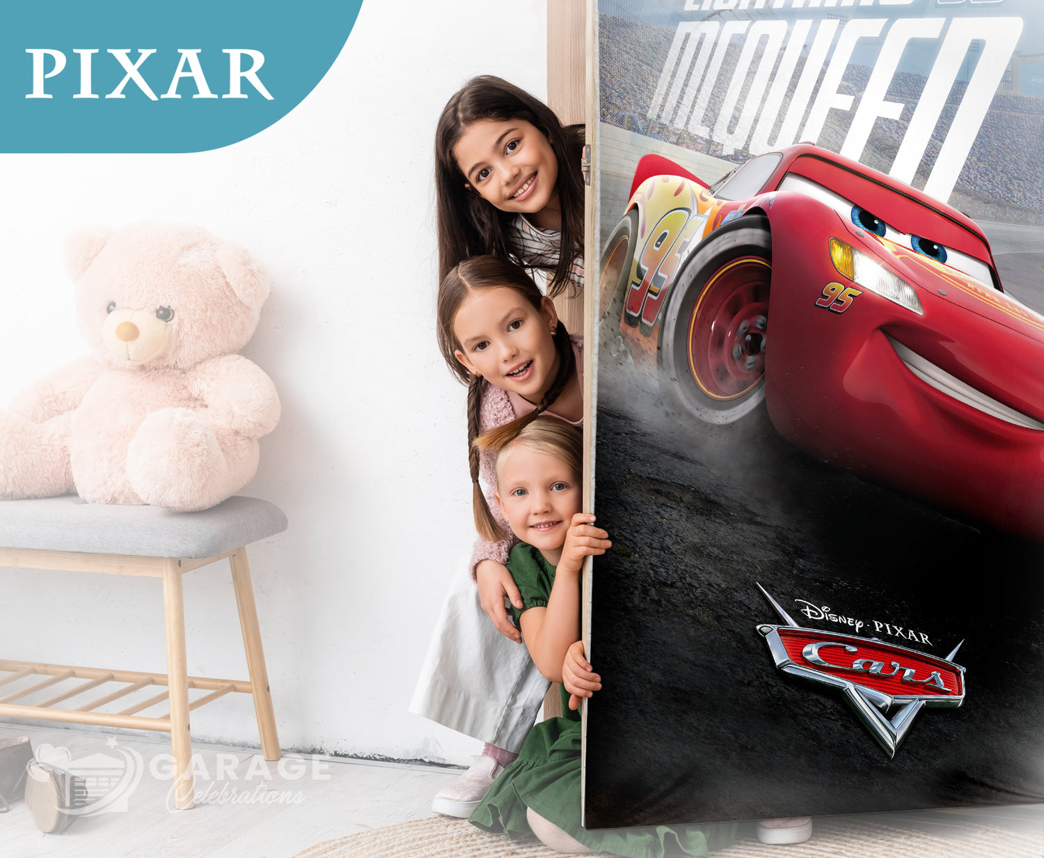 Children peeking from behind a 'Cars' movie poster with a teddy bear and chair in the background.