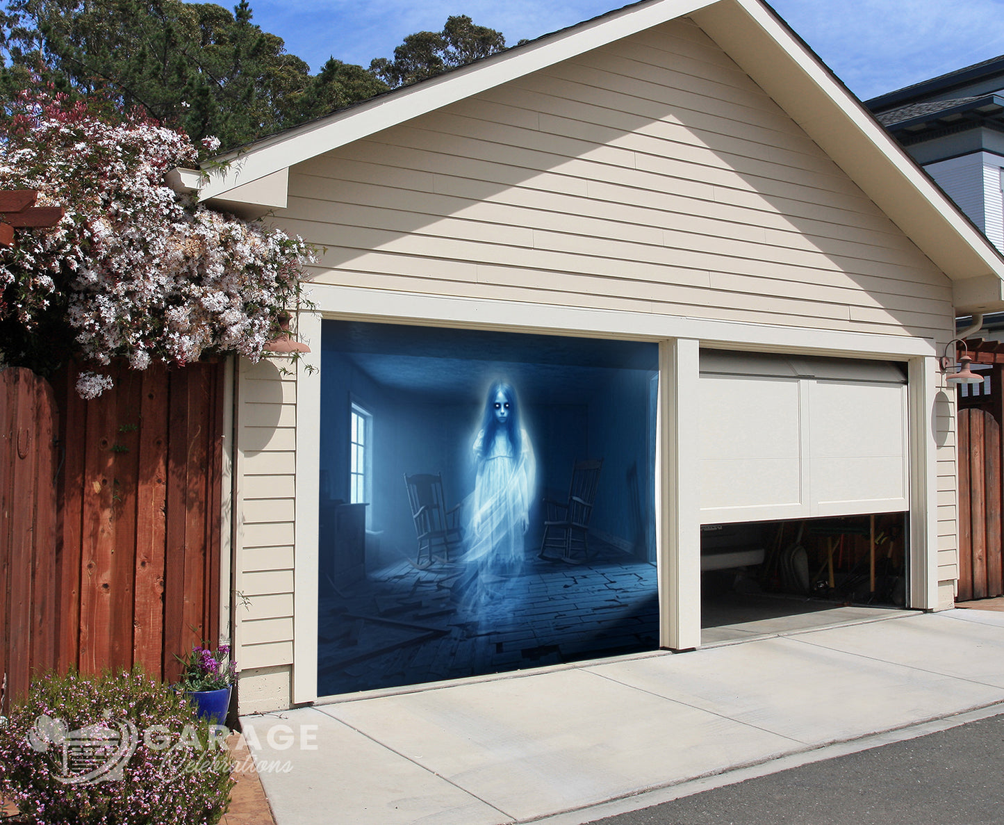 Garage door with a ghostly figure design in a residential setting.