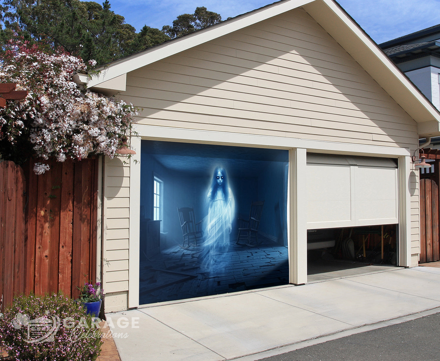 Garage door with a ghostly figure design in a residential setting.