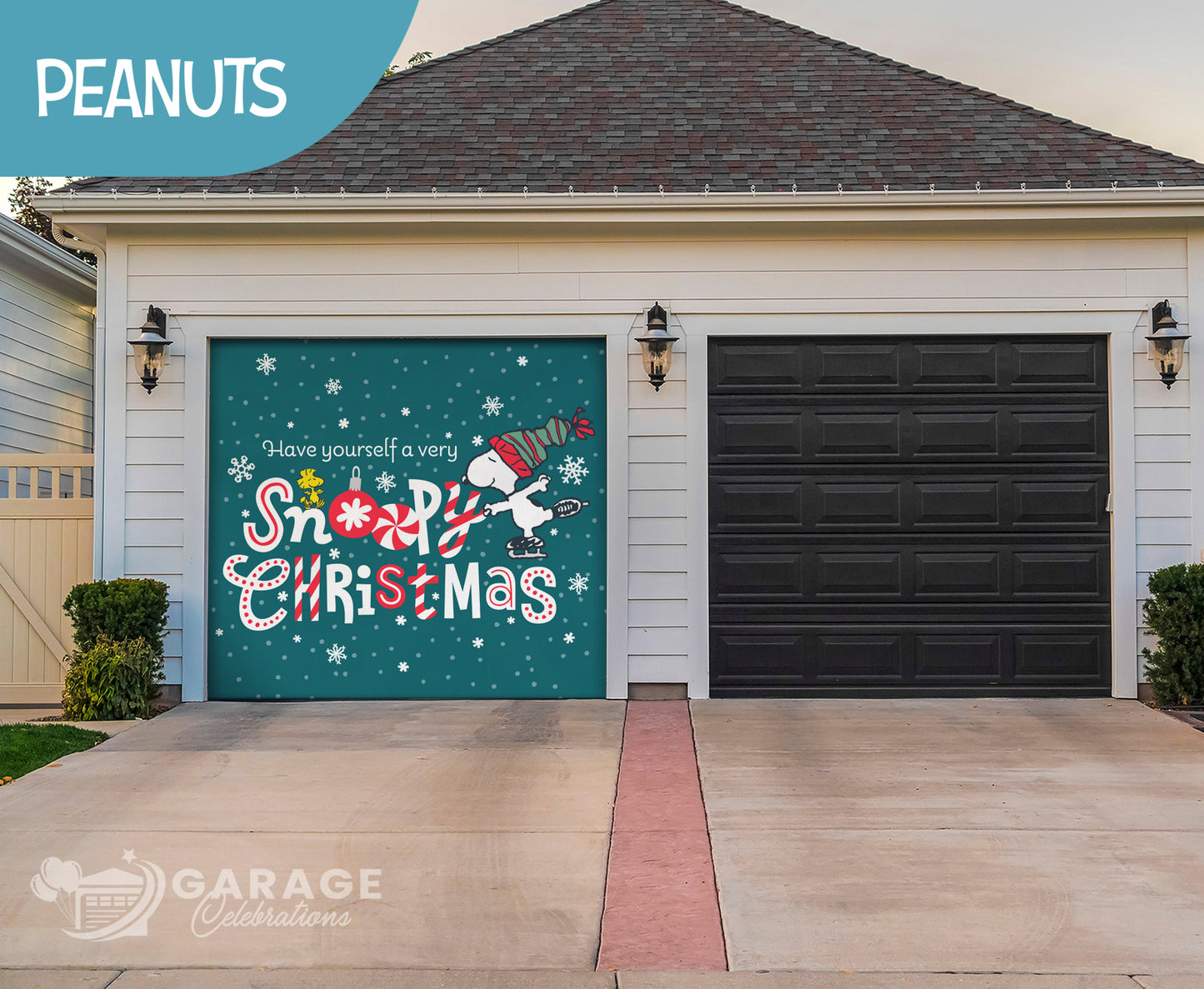 A garage door decorated with a Christmas-themed Peanuts character scene featuring Snoopy and Woodstock.