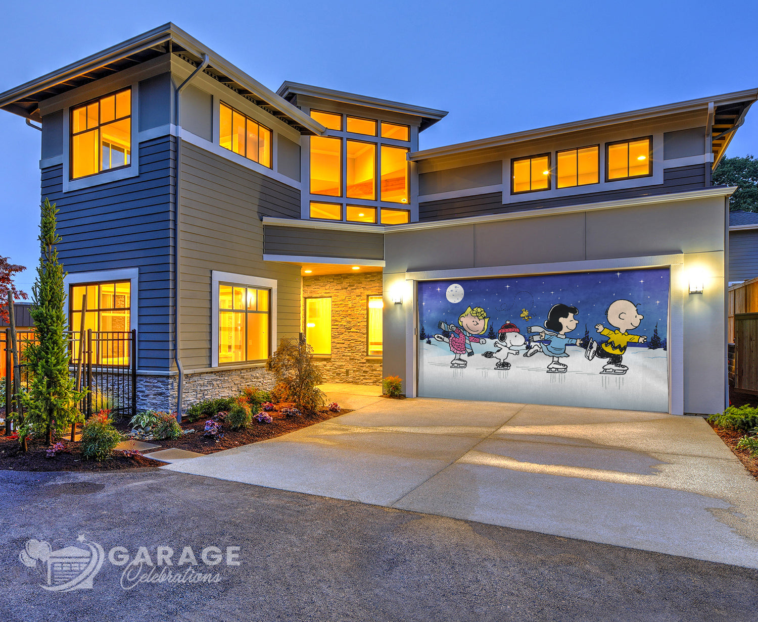Modern home at night showing garage door cover featuring cartoon characters from the Peanuts series, including Snoopy and Charlie Brown skating at night under a starry sky.