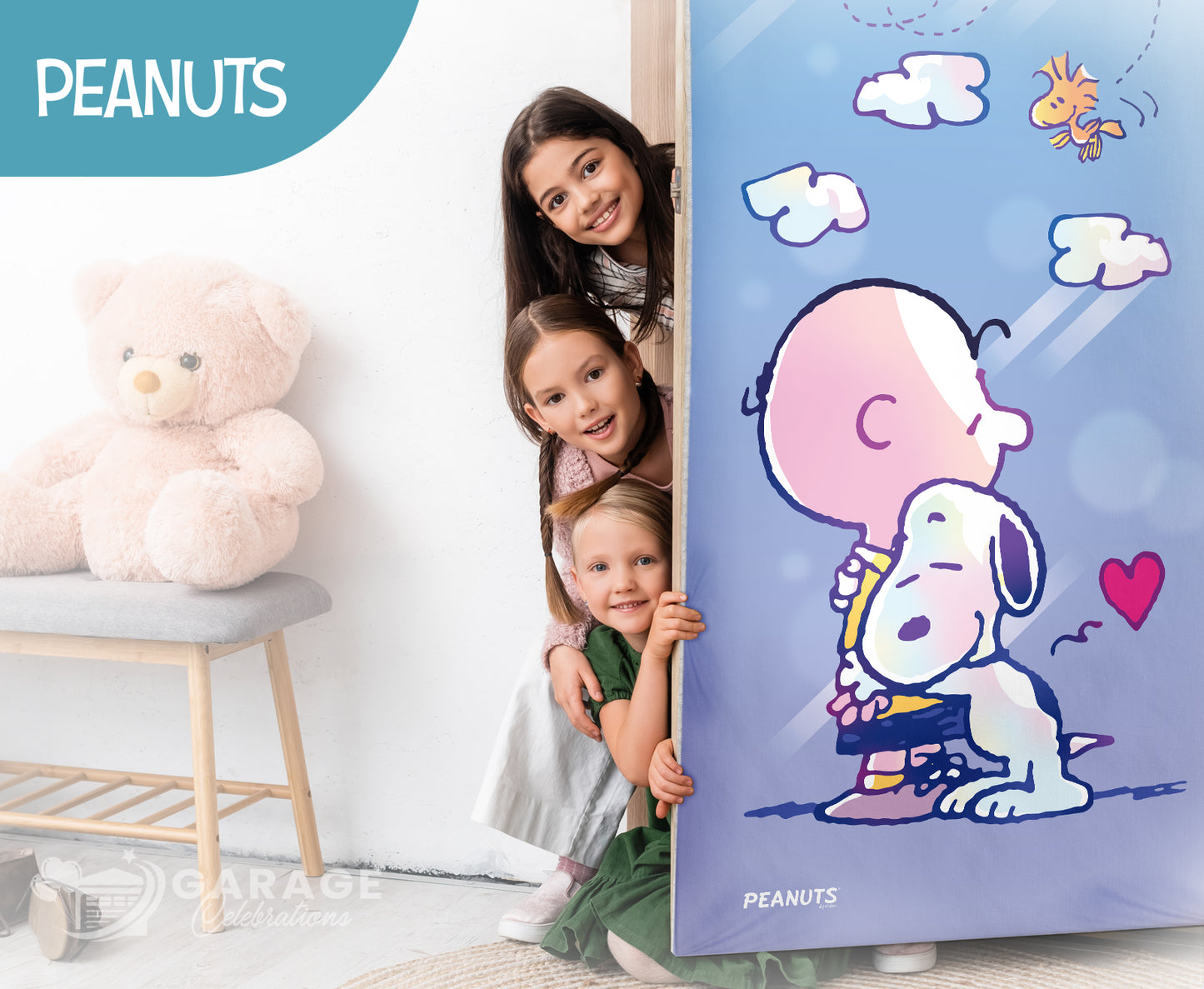 Children peeking from behind a door with a Peanuts-themed poster, featuring Snoopy and Woodstock.